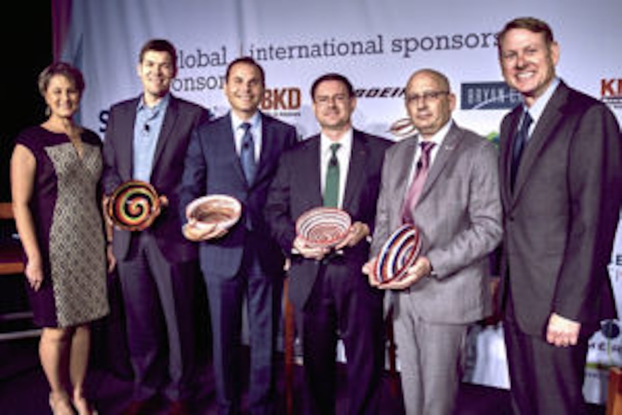 Image of panelists holding up decorated bowls