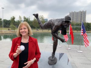 Mayor Lyda Krewson gifts bronze statue of Cardinals player Adam Wainwright to St. Louis sister city Nanjing, China.
