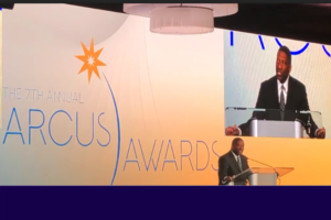 STL Partnership CEO and President Rodney Crim presents an Arcus award at the St. Louis Regional Chamber's 2020 Arcus Awards.