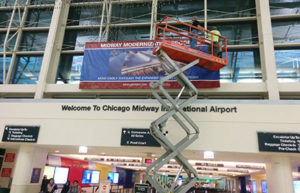 Cross Rhodes Print & Technologies Chicago Midway International Airport project consisted of full color vinyl banner installed to concrete barrier. 