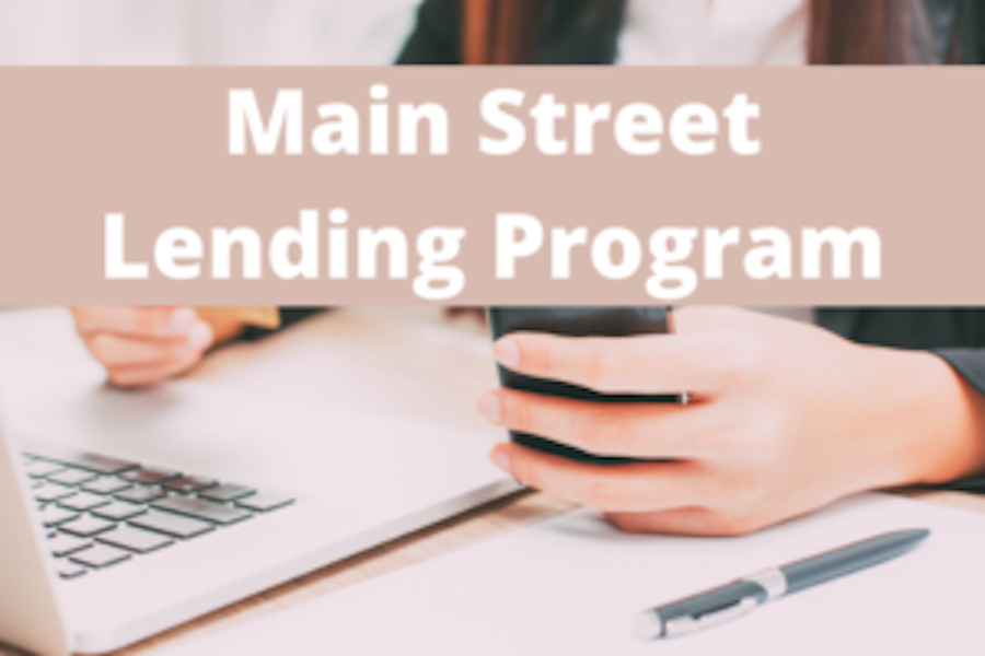 Image of a person using a computer that says Main Street Lending Program