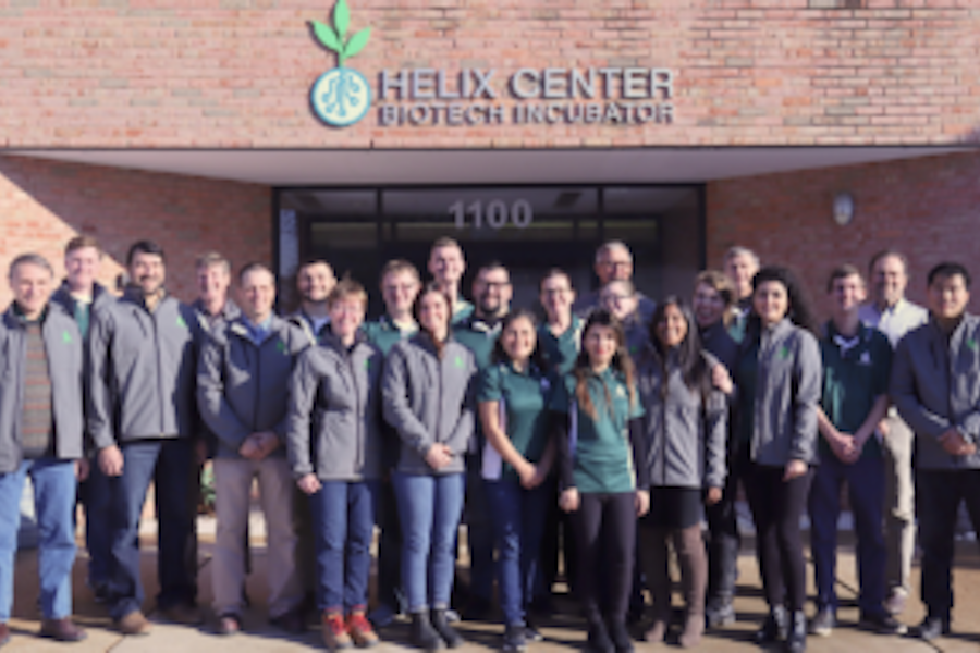Group photo of people standing outside Helix Center