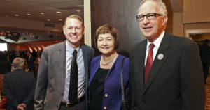 Crosslin receives the St. Louis Mosaic Award  presented by the St. Louis Economic Development Partnership in 2014. (left to right) Tim Nowak, Executive Director of the World Trade Center, Anna Crosslin and Bob Fox. 