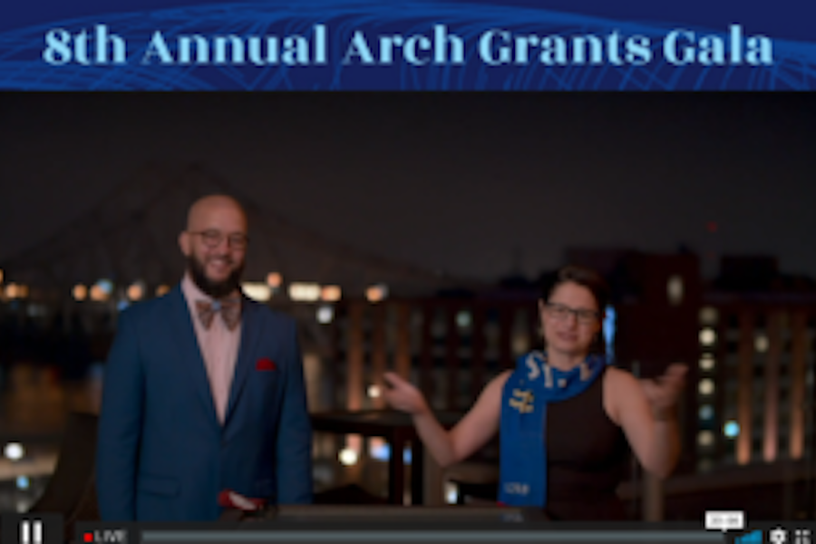 Image of two people in black tie outfits overlooking a city that reads 8th annual arch grants gala