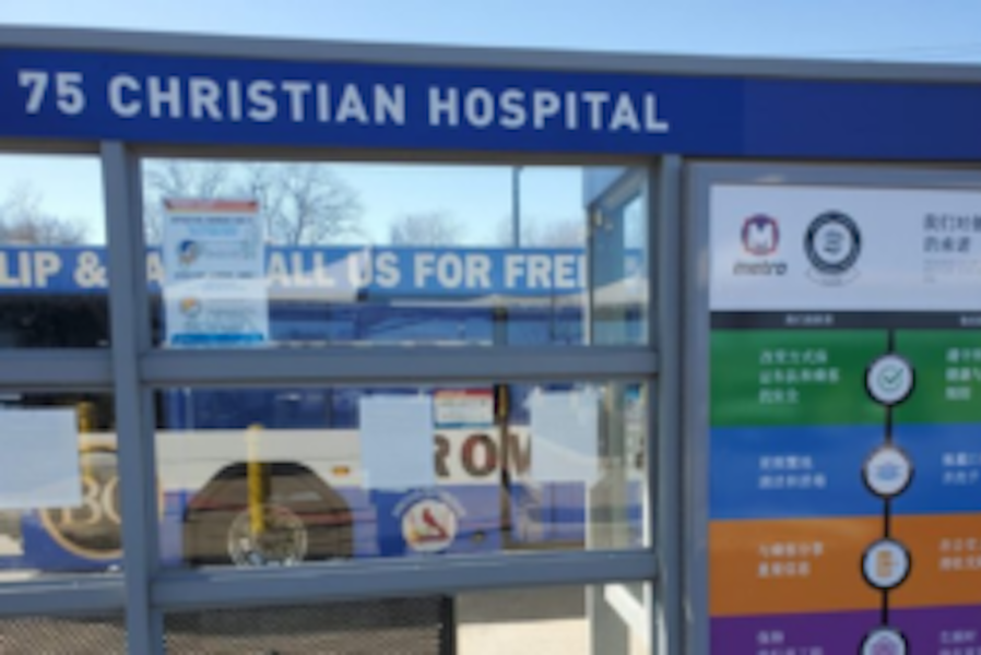 Image of a bus bench that reads 75 Christian Hospital