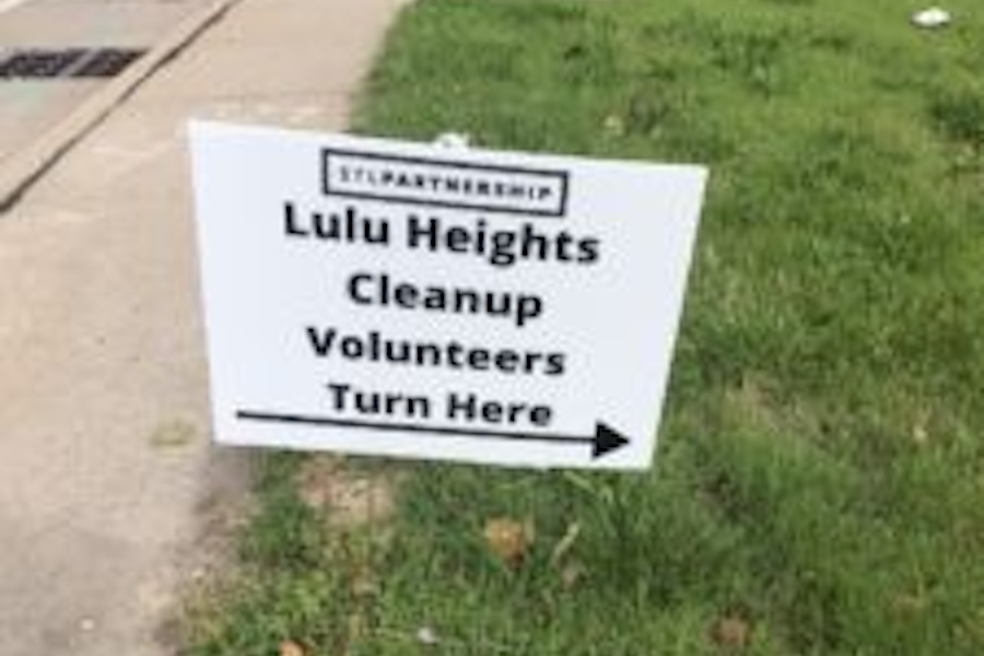 SIgn that says Lulu heights Cleanup Volunteers Turn Here
