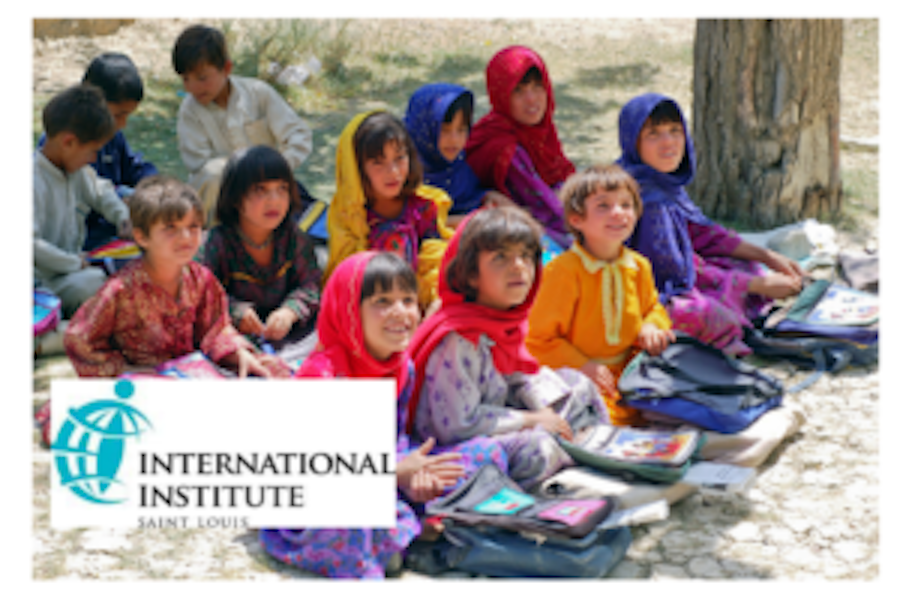 Image of children sitting with a logo that says international institute