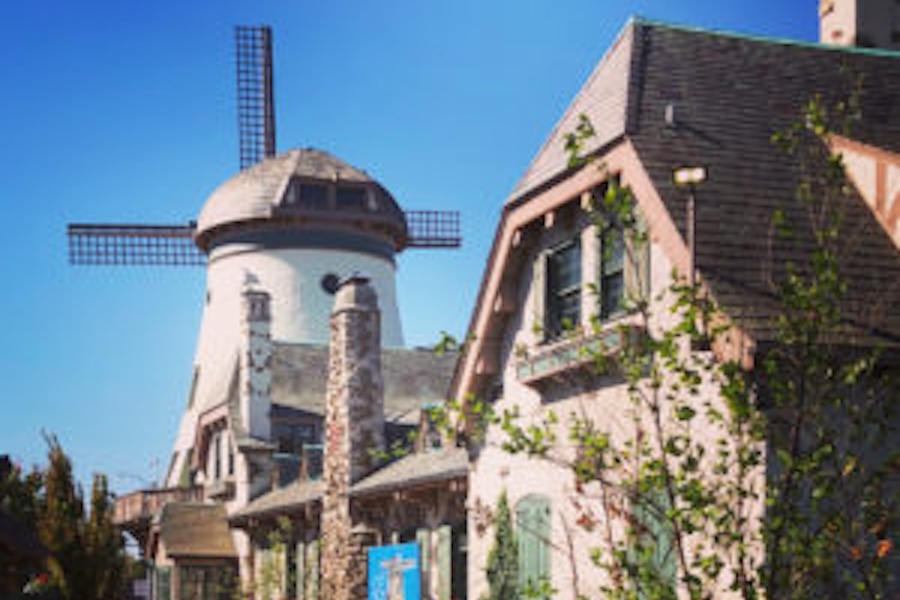 Image of a windmill and building