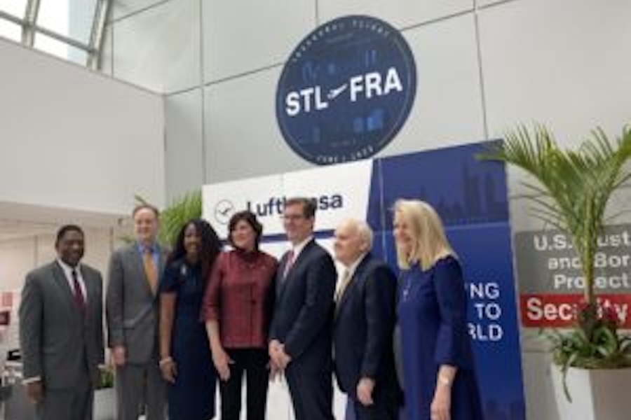 Group Photo at the STL airport that says STL to FRA