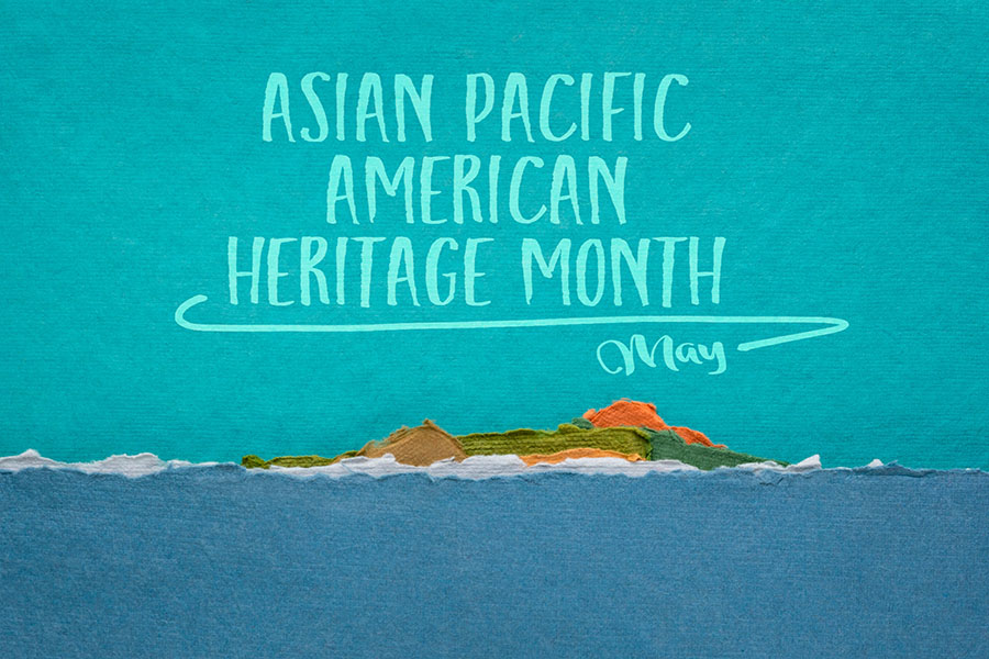 Blue graphic that looks like the ocean and sky with text that reads, "Asian Pacific America Heritage Month - May"