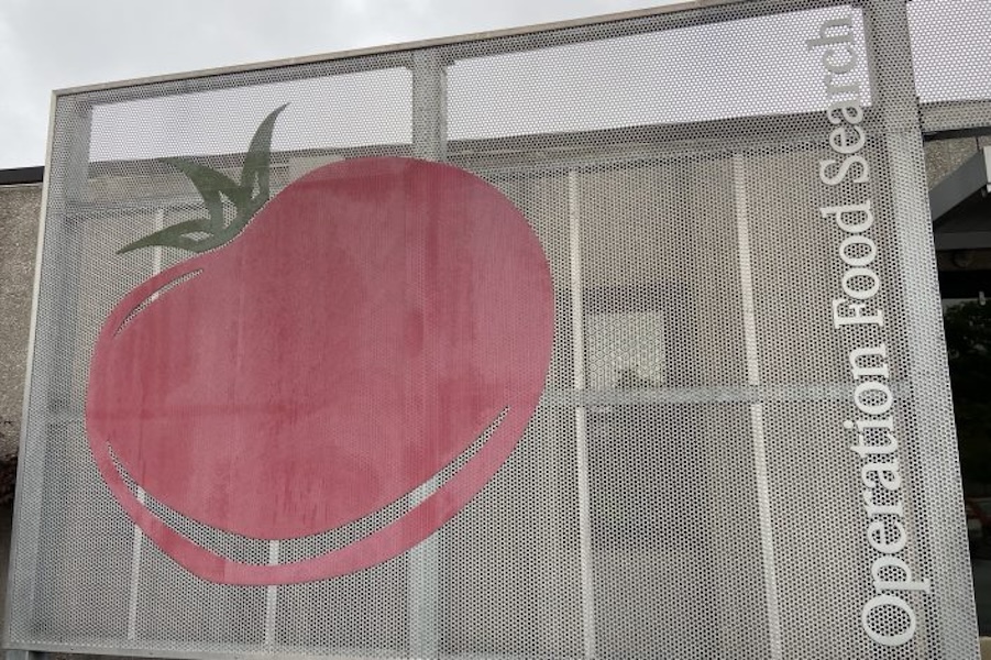 Image of the outside of the Operation Food Search building that shows a giant tomato