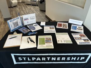 Table with many brochures and flyers on it