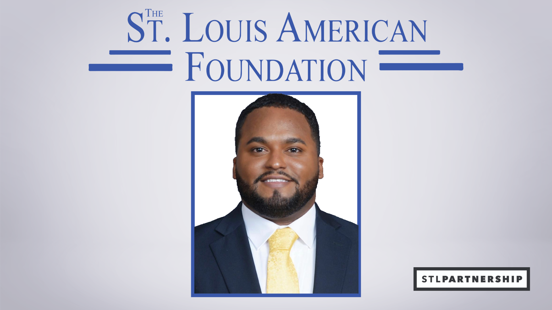 picture of a smiling man underneath the st. louis american foundation logo next to the stl partnership logo