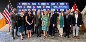 A large group of people pose for a photo