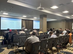 Group of attendees in a conference room