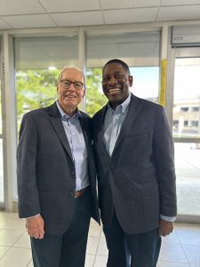 two men smile for a photo (Rodney Crim and Ambassador O'Malley)