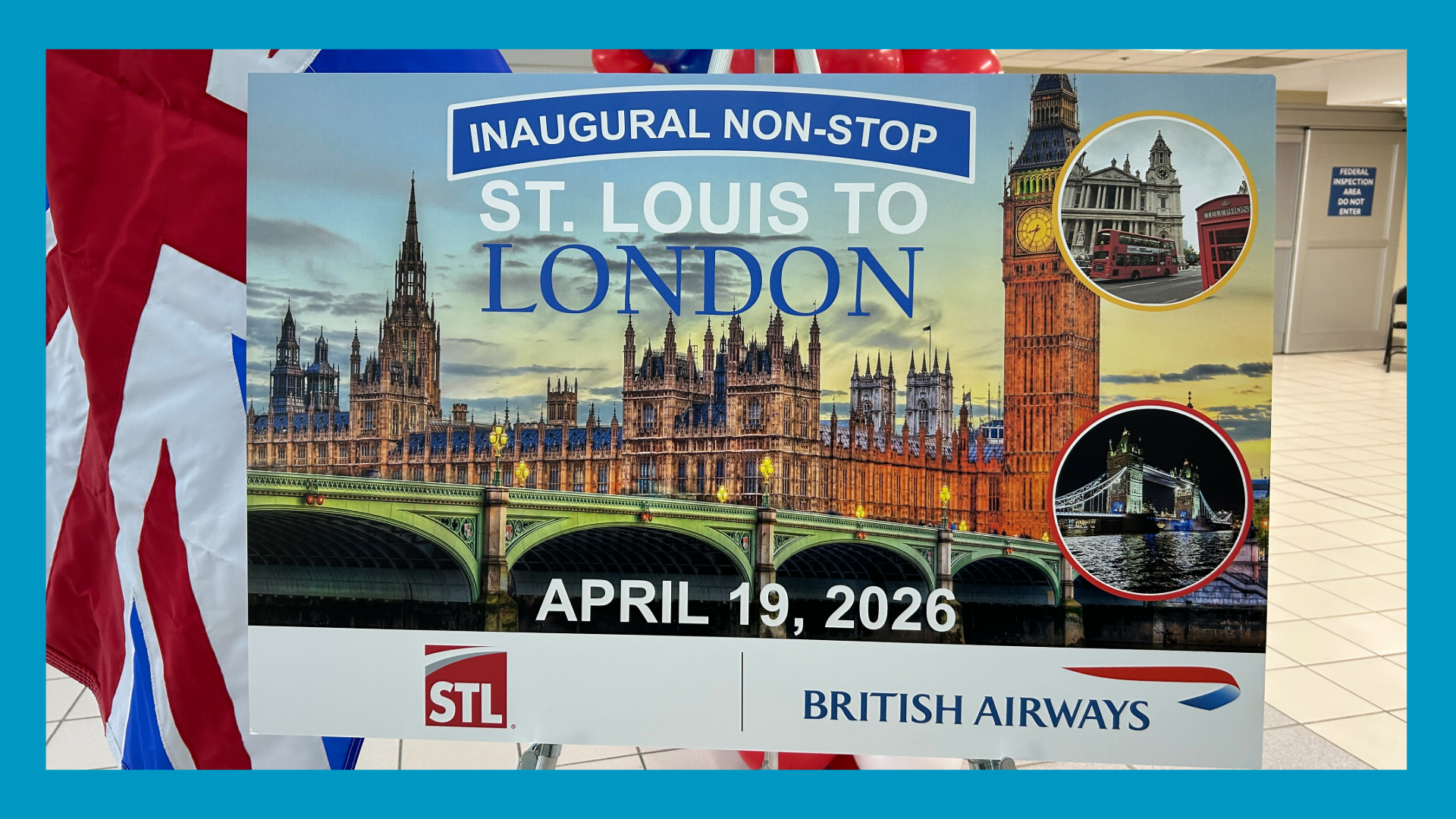 A blue border surrounds a picture of a sign with St. Louis to London written on it and architecture drawn in the background. Behind the sign is a UK flag and some blue and red balloons
