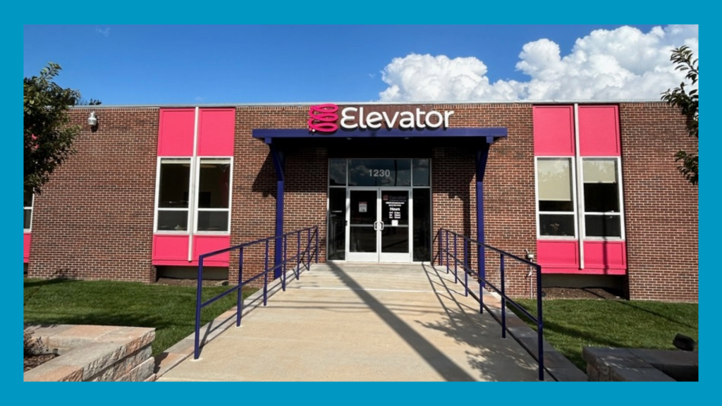 image of elevator st. louis building with blue border