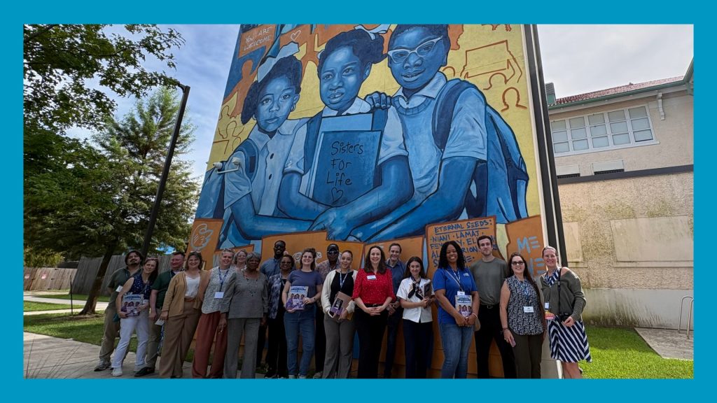 TEP Center Tour Group Group Photo in front of mural